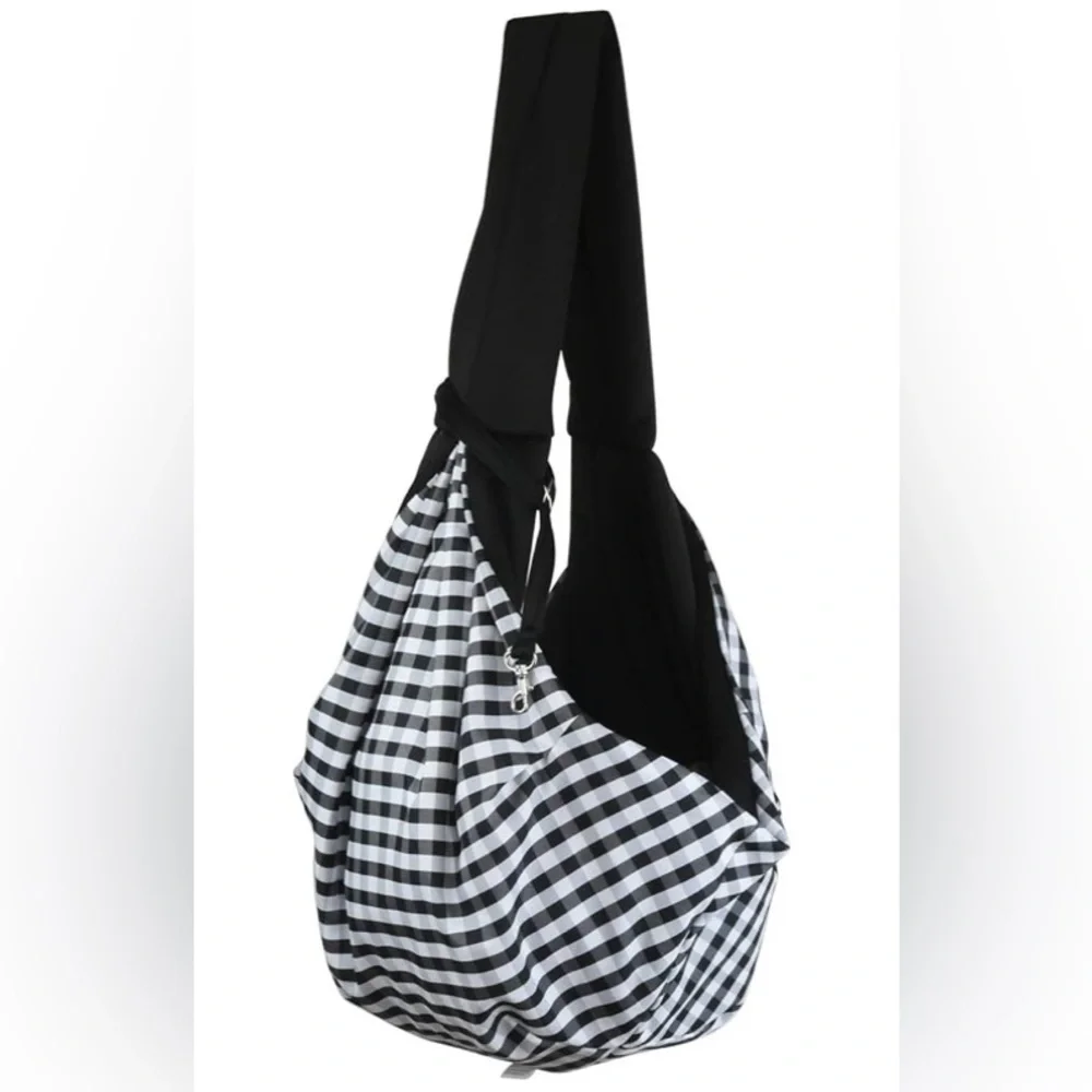 Dog and Cat Sling Carrier. Hands Free and  Reversible for medium pets.
